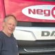 William Frostman in front of the Neg Earth Lights van.